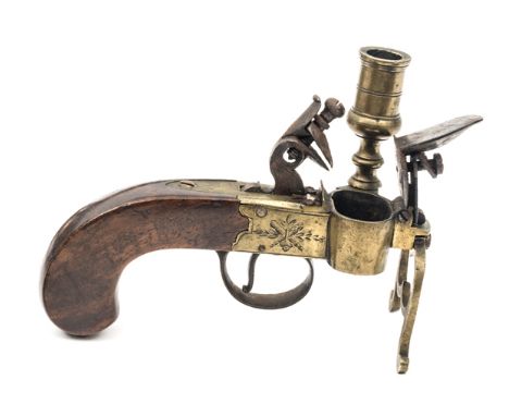 An early 19th century flintlock boxlock tinder lighter, 5½” overall, of all brass construction, with engraved frame, baluster