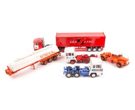 4 white metal 1:43rd scale 1970’s-80’s truck. FTF 4 axle tractor unit with articulated 3 axle skeletal trailer. Loaded with a