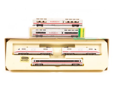 An N gauge Minitrix German DB ICE 3 car electric multiple unit (12855). Power unit and trailer driving car with an intermedia