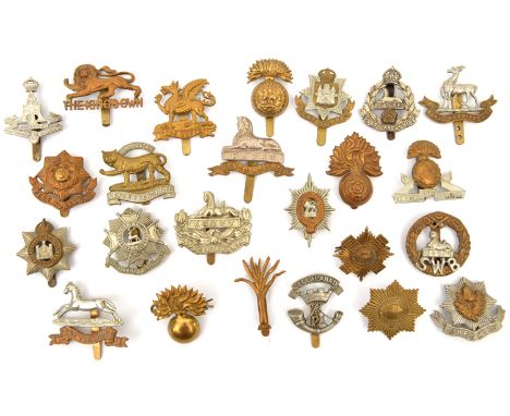 24 different Guards and infantry cap badges,  including Grenadier, Coldstream, Scots and Welsh Gds, KORR, R Warwicks, Lincoln