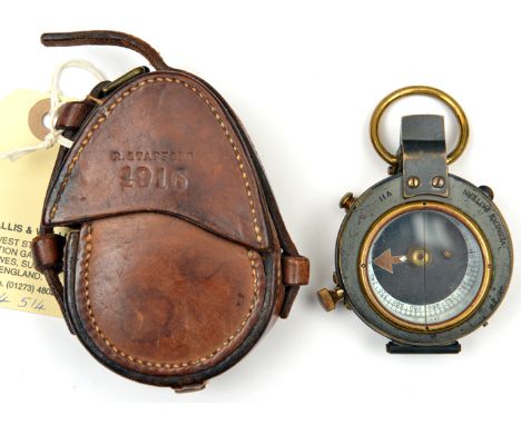 A WWI prismatic marching compass, marked “Vernier’s Pattern VII” and “F Darton & Co, London, No 11766, 1914” and broad arrow,