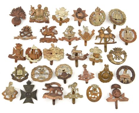 30 different infantry cap badges,  including Queens without title, R Warwicks, Devon, Leicester, SWB, W Riding, R Sussex, Ham