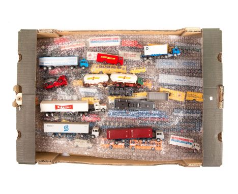 A quantity of HO gauge vehicles by Wiking. Examples include; articulated tankers with trailers, container lorries, car transp
