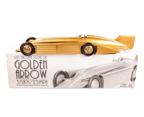 A Schylling Collector Series 1929 Land Speed Record Car Golden Arrow. A North American produced numbered limited edition cloc