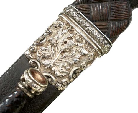 30.5cm fullered blade with faceted back edge, struck with a maker's mark for McKINLAY EDINBURGH, characteristic hilt with thi