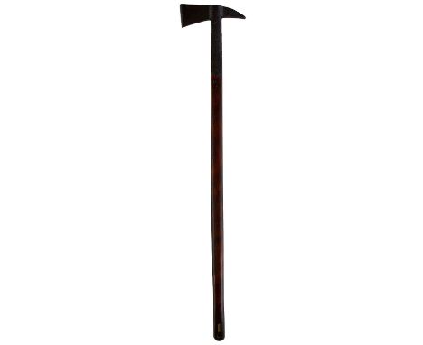 9cm across the face, 24.5cm from the face to the tip of the flat tapering fluke, patinated, secured to a wooden haft with dee