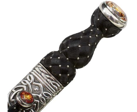 28cm clean and bright fullered blade with faceted back edge, characteristic hilt with carved basket weave wooden grip set wit