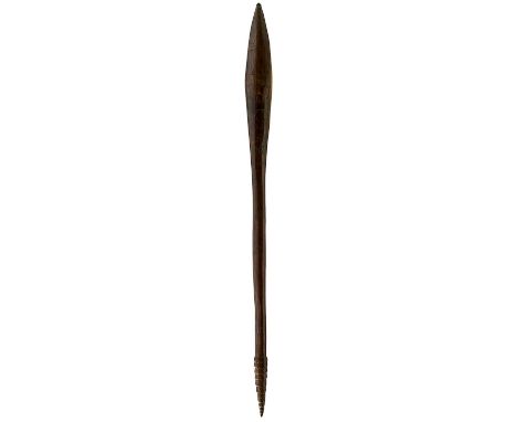 71cm over all length, the head carved with geometric designs and a snake, scale carved grip, the latter would suggest Queensl
