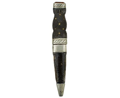 6cm blade engraved with a thistle and leaf motif to either side, characteristic carved basket weave wooden hilt set with bras