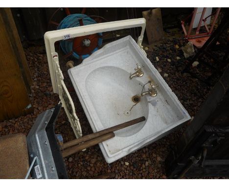 Marble sink with iron wall bracket