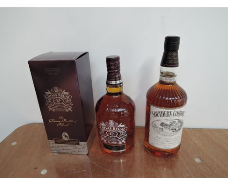 A bottle of Chivas Regal 12 Year Old Blended Scotch Whisky 40% vol, 1 litre in card box and a bottle of Southern Comfort Liqu