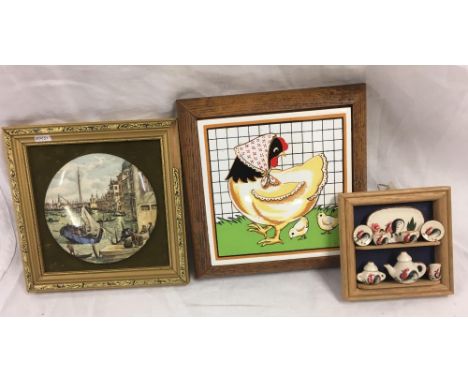 FRAMED CERAMIC POT LID OF A BUSY HARBOUR SCENE TOGETHER WITH 2 OTHER FRAMED CERAMIC ITEMS