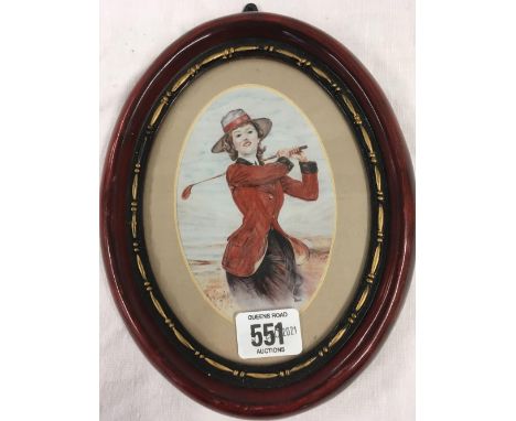 OVAL PORTRAIT MINIATURE OF A LADY GOLFER, INDISTINCTLY SIGNED