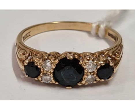 A GOOD SAPPHIRE &amp; DIAMOND 7 STONE RING SET IN 9ct 