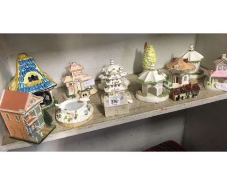 SHELF OF APPROX 12 BONE CHINA &amp; POTTERY COTTAGES, SOME BY COALPORT