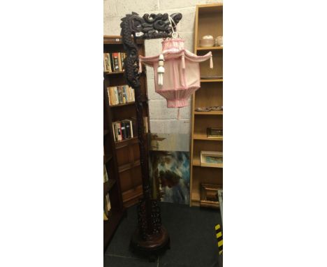 ORIENTAL CARVED WOODEN STANDARD LAMP IN THE FORM OF A DRAGON WITH FABRIC SHADE
