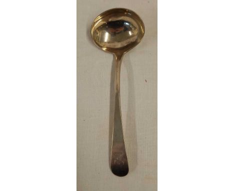 A GEORGIAN SILVER SAUCE LADLE WITH CREST, EDINBURGH 1809 BY J.M