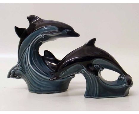 Two Poole dolphins. Condition report: see terms and conditions