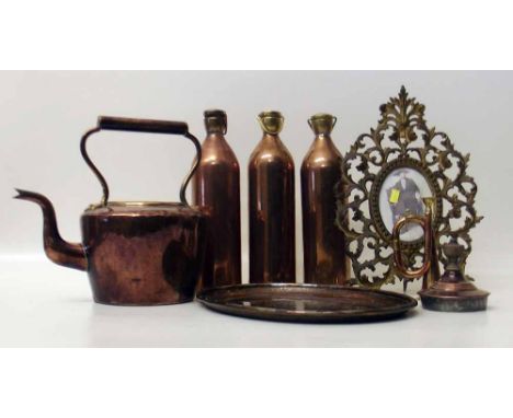 Three copper and brass flasks, miniature bugle, copper kettle, oval copper and inlaid tray and pierced brass picture frame. C