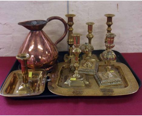 Three pairs of brass candlesticks, a chamber stick, tray and a copper measure jug Condition report: see terms and conditions