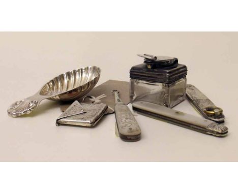 Two silver pen knives, silver caddy spoon, button hook, silver lidded inkwell and silver stamp case. Condition report: see te