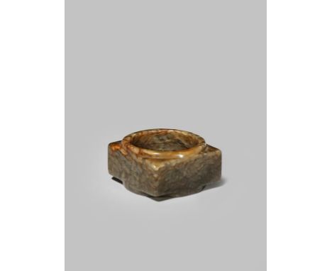 A SMALL CHINESE MOTTLED GREY-BROWN JADE CONG MING DYNASTY Carved with a large central hole and undecorated rectangular faces,