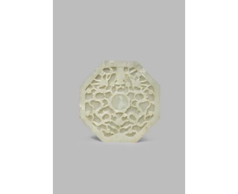 A CHINESE PALE CELADON JADE OCTAGONAL CUP STAND  LATE MING DYNASTY  Carved in relief with a pair of confronting dragons facin