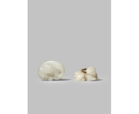 TWO CHINESE PALE CELADON JADE CARVINGS OF A QILIN QING DYNASTY OR LATER One carved with a lingzhi fungus spray in its mouth, 