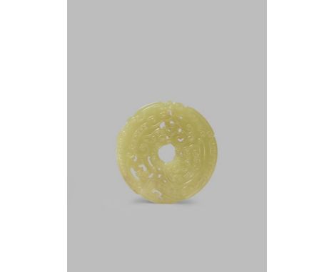 A CHINESE YELLOW JADE ARCHAISTIC CIRCULAR PLAQUE PROBABLY LATE QING DYNASTY Carved in low relief with two confronting stylise