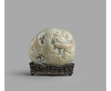 A MASSIVE CHINESE IMPERIAL PALE CELADON JADE 'BIRTHDAY' BOULDER  QIANLONG 1736-95  Carved in high relief with two figures car