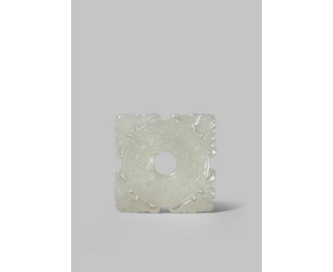 A CHINESE PALE CELADON JADE BI DISC QING DYNASTY OR LATER Carved in shallow relief with archaistic taotie masks on one side a