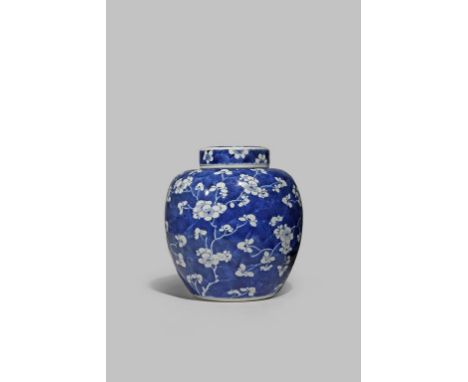 A CHINESE BLUE AND WHITE 'PRUNUS' JAR KANGXI 1662-1722 Decorated with blossoming prunus branches reserved on a cracked-ice gr
