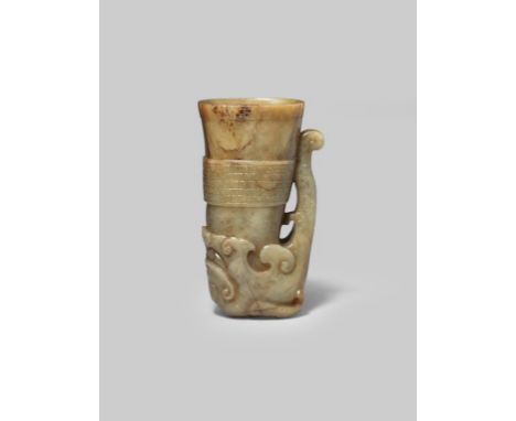 A CHINESE YELLOW AND RUSSET JADE ARCHAISTIC RHYTON, GONG MING/QING DYNASTY The subtly curved tapering body carved in shallow 