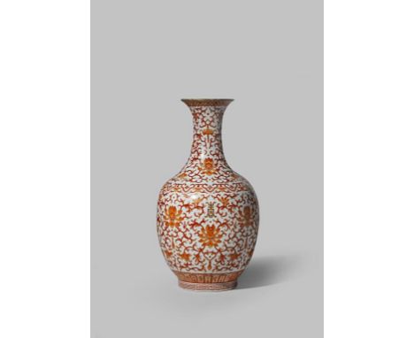 A CHINESE IRON-RED DECORATED 'LOTUS' VASE PROBABLY LATE QING The ovoid body decorated with lotus heads, scrolling foliage and