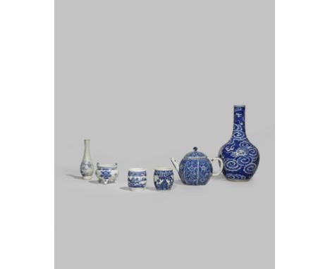 A SMALL COLLECTION OF CHINESE BLUE AND WHITE PORCELAIN MOSTLY 18TH CENTURY Comprising: a bottle vase decorated with a dragon 