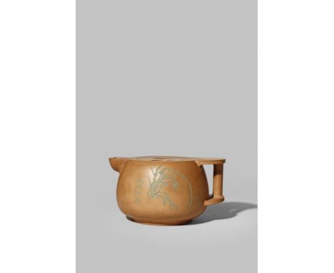 A CHINESE YU CHENG YAO YIXING TEAPOT 20TH CENTURY The ovoid body flattened at the top and bottom, one side decorated with an 