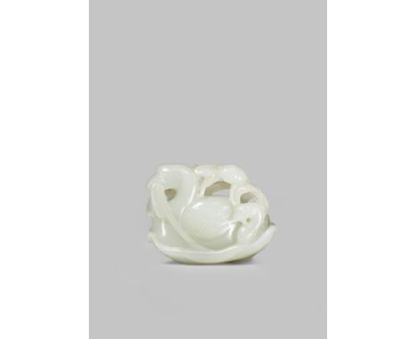 A CHINESE PALE CELADON JADE CARVING OF A DUCK WITH ITS YOUNG QING DYNASTY Floating on a lotus leaf, the ducks with lotus stem