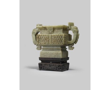 A LARGE CHINESE GREY-GREEN JADE ARCHAISTIC FANG GUI MING DYNASTY The deep rectangular-section body carved with protruding stu