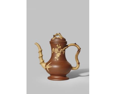 A CHINESE YIXING 'THREE FRIENDS OF WINTER' EWER 18TH CENTURY The simple pear-shaped body with a long neck, the spout moulded 