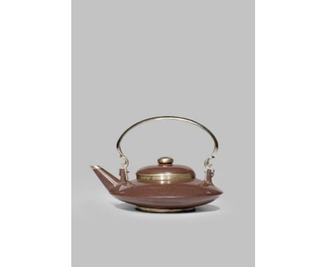 A CHINESE YIXING TEAPOT AND COVER QING DYNASTY Made for the Thai market, the flattened body with a bail handle, the rims and 