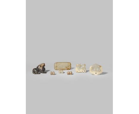 SEVEN SMALL CHINESE JADE ITEMS QING DYNASTY OR LATER Comprising: a small model of a qilin, a rectangular plaque engraved with