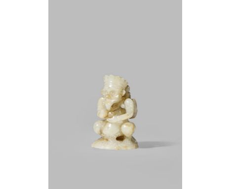 A CHINESE PALE CELADON JADE FINIAL PROBABLY MING DYNASTY Carved as a mythical bird-like creature, possibly Garuda with a crow