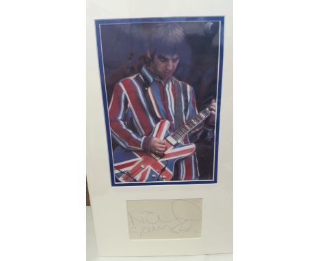 POP MUSIC, signed album page (6 x 4) by Noel Gallagher of Oasis, overmounted beneath colour photo, half-length playing Union 
