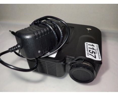 Mini LED Projector has HDMI connection with power supply, working at lotting. UK P&amp;P Group 2 (£20+VAT for the first lot a