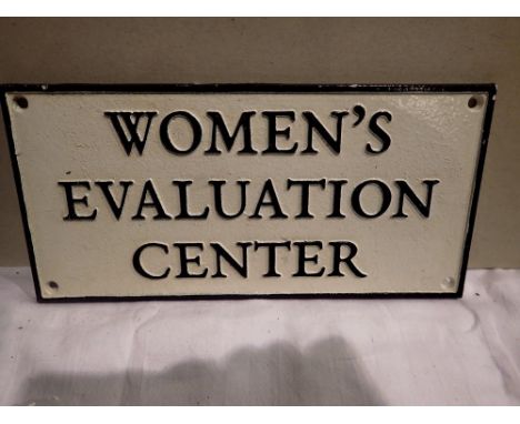 Cast iron Womens Evaluation sign, W: 30 cm. UK P&amp;P Group 1 (£16+VAT for the first lot and £2+VAT for subsequent lots) 