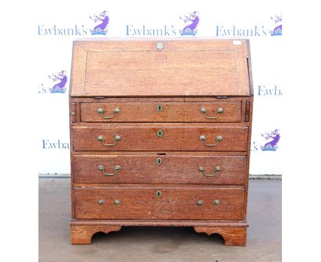 19th century oak bureau with fall flap enclosing cupboard and pigeon holes, over four long drawers on bracket feet, h105 x w9
