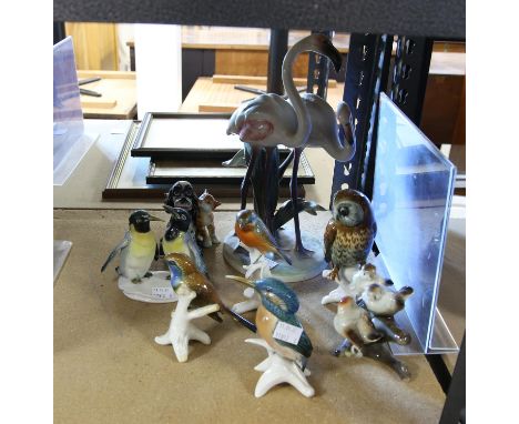 Karl Ens figures of kingfisher, blue tit, a pair of penguins, and other similar continental figures, including a Goebel figur