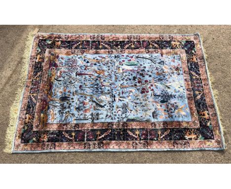 Persian rug, the light blue ground with animals, birds and trees within three borders, 195 x 136cm,