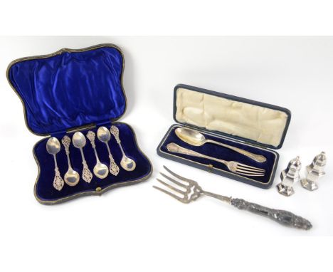 Cased set of six silver coffee spoons with cast foliate handles, London 1908, cased spoon and fork, Sheffield 1927, two simil