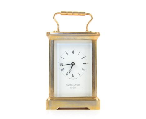 Mappin & Webb brass carriage clock with lever movement, the white enamelled dial with Roman numerals, 15.5cm high,